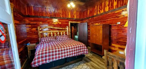 Log Cabin Innにあるベッド