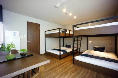 Postel nebo postele na pokoji v ubytování RoNa Hotel