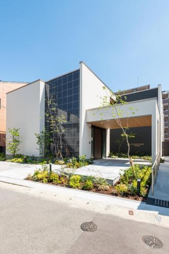 an external view of a building at HOTEL All Stay Hakata Kukodori in Fukuoka