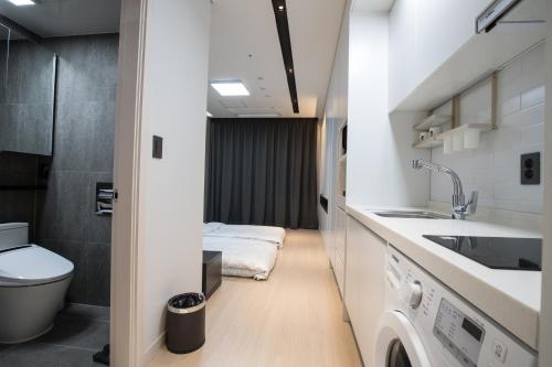 Ένα μπάνιο στο Sunrise Hotel Sokcho