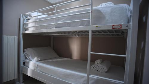 Двухъярусная кровать или двухъярусные кровати в номере Casa Galliani 15