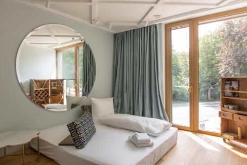 Llit o llits en una habitació de Jugend- und Familienhotel Augustin