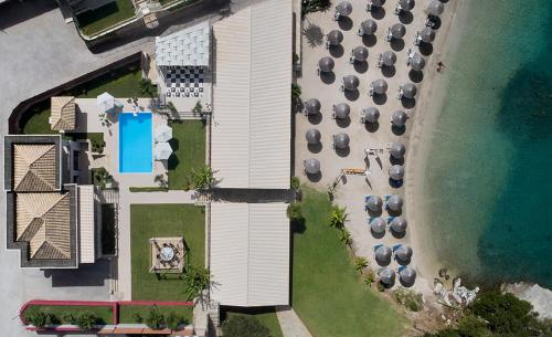 an overhead view of a parking lot with parked cars at Karvouno Villas in Sivota