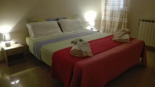 Posteľ alebo postele v izbe v ubytovaní Carini Luxury Apartment vicino aereoporto e al mare