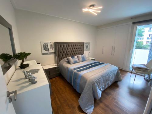 En eller flere senge i et værelse på Madalenas Palace - Sunrise