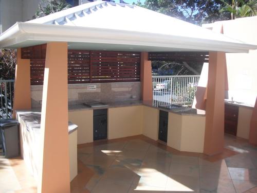 a kitchen with a roof over a patio at Crown Towers Resort Private Apartments in Gold Coast