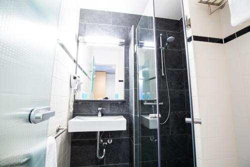 Ένα μπάνιο στο Bastion Hotel Roosendaal
