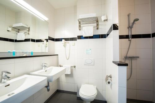 Bathroom sa Bastion Hotel Roosendaal