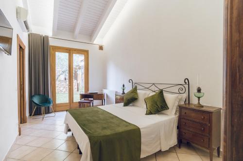 Posteľ alebo postele v izbe v ubytovaní Leano Agriresort