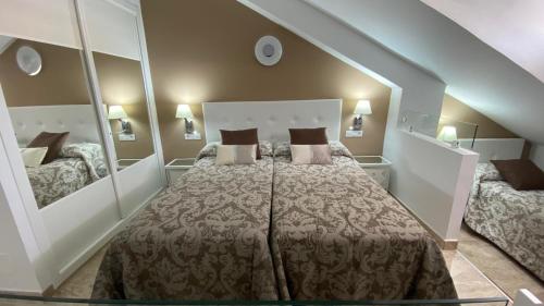A bed or beds in a room at PARQUE SANTIAGO 1 LUXURY APARTAMENT (Playa de las Américas)