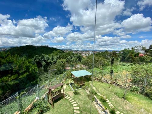 an elevated view of a park with a swing at Q&P Smart Ville in Da Lat