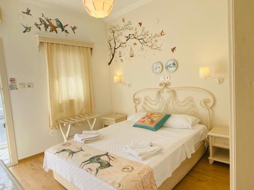 Postel nebo postele na pokoji v ubytování Bodrum Sade Pension
