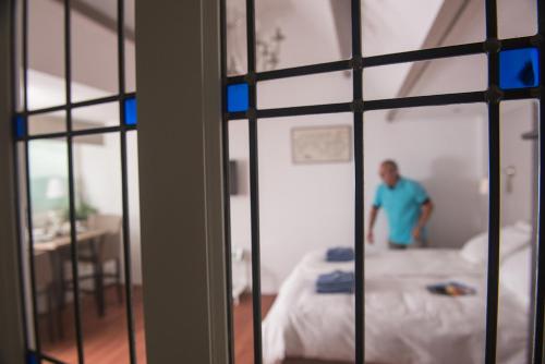 Postel nebo postele na pokoji v ubytování Heerenkeet Oosterschelde zicht 2 pers