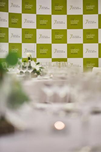 a close up of a checker board with a table at Silken Ciudad Gijón in Gijón