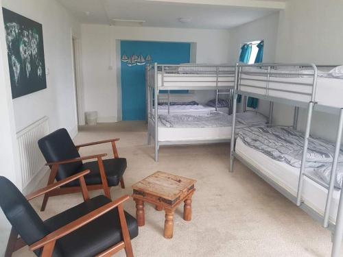Ένα ή περισσότερα κρεβάτια σε δωμάτιο στο Blue Room Hostel Newquay