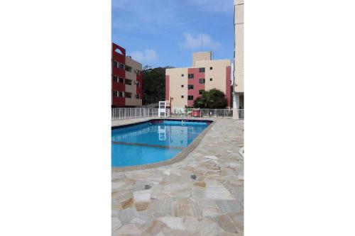 Kolam renang di atau di dekat Apartamento com piscina Condomínio Balneário Camboriú
