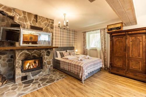 En eller flere senge i et værelse på Apartamenty Zielona Owieczka