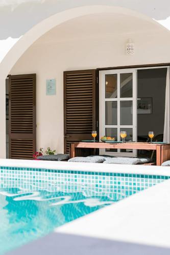 a view of a swimming pool in a villa at Beachfront Villa with Private Pool in Manta Rota in Vila Nova De Cacela