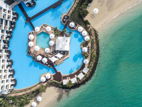an aerial view of a resort on the beach at InterContinental Hayman Island Resort, an IHG Hotel in Hayman Island