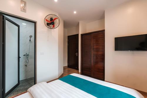 Ένα ή περισσότερα κρεβάτια σε δωμάτιο στο Ha Giang Cozy Hostel