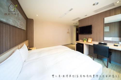 Photo de la galerie de l'établissement Smile 73 Hotel, à Taichung
