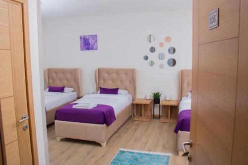 Ένα ή περισσότερα κρεβάτια σε δωμάτιο στο Motel KVELE