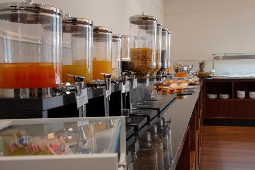 a kitchen with a bunch of food on a counter at Luna Hotel de Tábua in Tábua