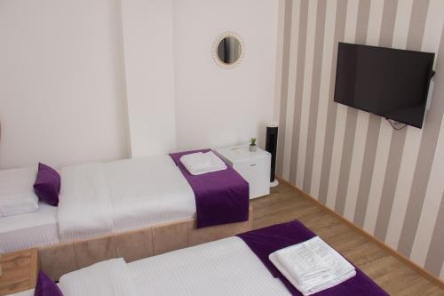 Ένα ή περισσότερα κρεβάτια σε δωμάτιο στο Motel KVELE
