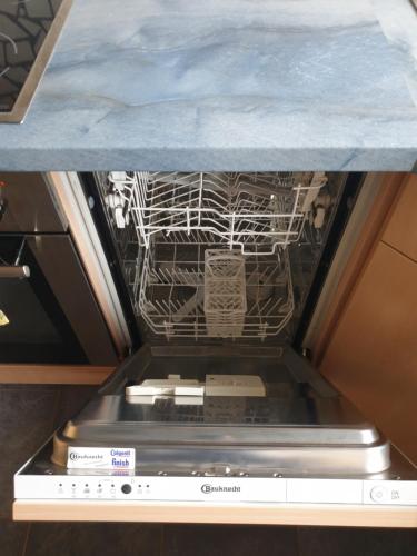 an oven with a dish rack inside of it at Querenhorst, Unterkunft am Feld in Querenhorst