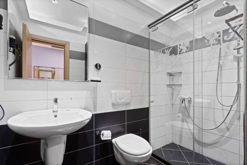 Ванная комната в Hotel Relax