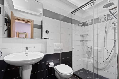 Koupelna v ubytování Hotel Relax