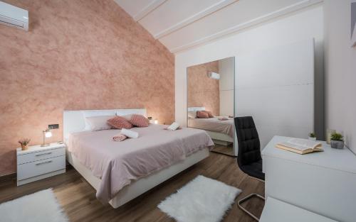 Una cama o camas en una habitación de Villa Desapemani