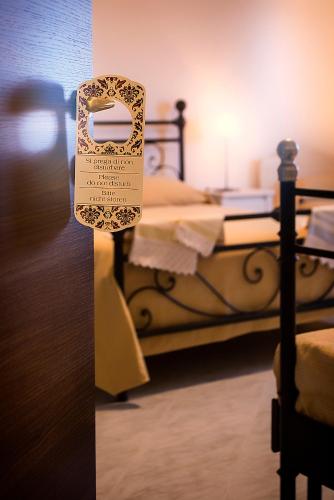 Bed and Breakfast Nonna Loretaにあるベッド