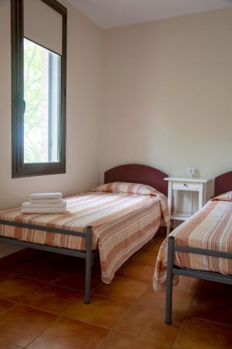 Postel nebo postele na pokoji v ubytování El Miracle