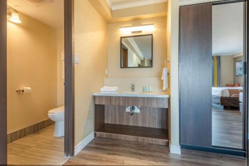A bathroom at Quality Inn and Suites