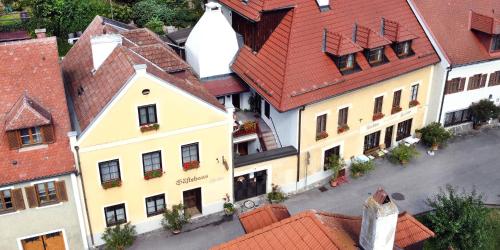 an overhead view of a building with red roofs at Pension Gästehaus Heller in Weissenkirchen in der Wachau