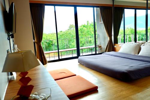 Giường trong phòng chung tại Hyde198homeresort