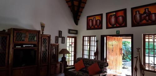 The lounge or bar area at African Ambience Guest House