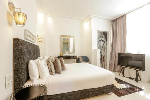 TV/Unterhaltungsangebot in der Unterkunft Suite Azur Hotel