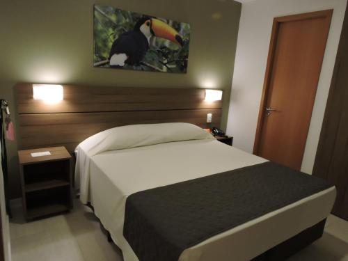 Ein Bett oder Betten in einem Zimmer der Unterkunft Bristol Umarizal Belem