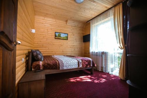 Postel nebo postele na pokoji v ubytování Apartments in Polyana
