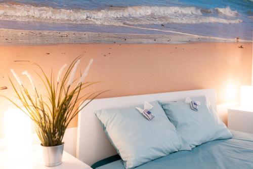 Posteľ alebo postele v izbe v ubytovaní Apartament Blue Sea Gdynia