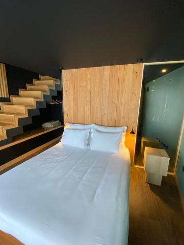 Кровать или кровати в номере Casa da Horta