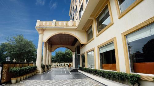 an entrance to a building with an archway at The Fern Residency Sarnath in Varanasi