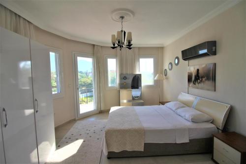 Postel nebo postele na pokoji v ubytování Dalyan Villa Pervin