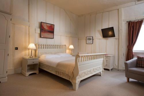 מיטה או מיטות בחדר ב-The George Hotel & Brasserie, Cranbrook