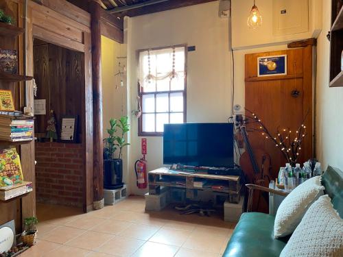 Una televisión o centro de entretenimiento en 緩緩歸 Slow living