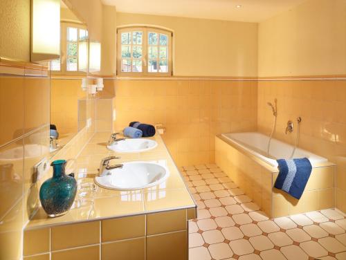Vonios kambarys apgyvendinimo įstaigoje Hotel & Restaurant Burgschänke