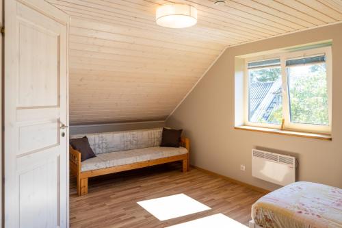 Postel nebo postele na pokoji v ubytování Cosy Family Guesthouse with Sauna and Garden