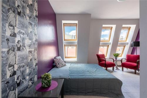 Posteľ alebo postele v izbe v ubytovaní Apartament Broadway